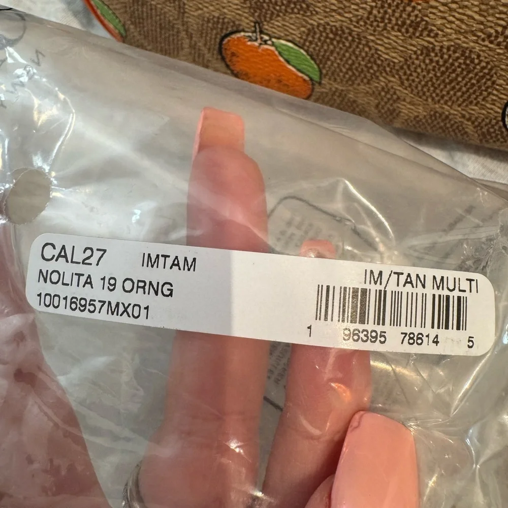 Coach Tan and Orange Citrus Nolita purse